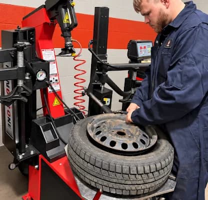 A tire being mounted on the changer at A-Service in Edmonton
